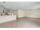 Spacious living room offers wood floors, breakfast bar, recessed lighting, and a ceiling fan at 211 Pine Forest Dr., Conway, SC 29526