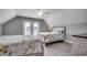 Bright bedroom with two beds, neutral tones, and a glass door leading to a balcony at 211A 15Th Ave. S, Surfside Beach, SC 29575