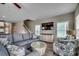 Cozy living room with a large sectional sofa, TV, and stylish decor for relaxation at 211A 15Th Ave. S, Surfside Beach, SC 29575