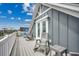 Balcony with rocking chairs and an ocean view at 211B 15Th Ave. S, Surfside Beach, SC 29575
