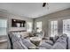 Living room with TV, access to a deck, and comfortable seating at 211B 15Th Ave. S, Surfside Beach, SC 29575