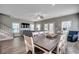 Open floor plan with dining area, living room, and staircase at 211B 15Th Ave. S, Surfside Beach, SC 29575