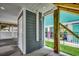 Enclosed outdoor shower with a door at 211B 15Th Ave. S, Surfside Beach, SC 29575
