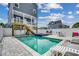 Backyard pool featuring lounge chairs and a patio set at 211B 15Th Ave. S, Surfside Beach, SC 29575