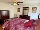 Bright main bedroom features hardwood floors, traditional furnishings, and neutral wall colors at 216 Walden Lake Rd., Conway, SC 29526