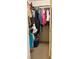 Closet with clothes hanging on racks and a blue storage bin on the floor at 216 Walden Lake Rd., Conway, SC 29526