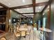 Bright game room boasts a dartboard, pool tables and a relaxing seating area, perfect for entertainment at 216 Walden Lake Rd., Conway, SC 29526