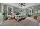 Spacious primary bedroom with multiple windows for natural light and ample space at 24 Jerry Ct., Pawleys Island, SC 29585