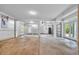 Large garage featuring both traditional and sliding garage doors and plenty of open space at 24 Jerry Ct., Pawleys Island, SC 29585
