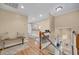 Inviting hallway with hardwood floors, stairway and neutral color scheme at 24 Jerry Ct., Pawleys Island, SC 29585