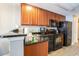 Galley kitchen features granite countertops, stainless steel sink and appliances at 2600 N Ocean Blvd. # 1406, Myrtle Beach, SC 29577