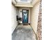 Cozy front porch with a decorative wreath on the door and a welcoming doormat at 2707 Canvasback Trail, Myrtle Beach, SC 29588