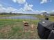 Expansive backyard with calming lake views, perfect for outdoor activities and gatherings at 297 Harvest Ridge Way, Conway, SC 29527