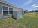 The backyard features a convenient storage shed and space for outdoor enjoyment at 297 Harvest Ridge Way, Conway, SC 29527