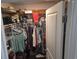 Walk-in closet with built-in shelving, hanging rods, and ample storage space for organization at 297 Harvest Ridge Way, Conway, SC 29527