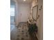 Inviting entryway featuring a decorative rug, console table with mirror, and stylish wall decor at 297 Harvest Ridge Way, Conway, SC 29527