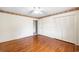 Bedroom with hardwood floors, closet and window at 316 Oliver St., Marion, SC 29571
