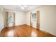 Cozy bedroom with hardwood floors and two bright windows at 316 Oliver St., Marion, SC 29571