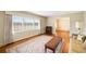 Bright living room featuring a large window, hardwood floors, and area rug at 316 Oliver St., Marion, SC 29571