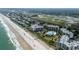 Aerial view of an oceanfront community with a swimming pool and beach access at 341 South Dunes Dr. # C-34, Pawleys Island, SC 29585