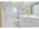 Clean bathroom featuring a shower-tub, a large mirror, white vanity, and tile flooring at 341 South Dunes Dr. # C-34, Pawleys Island, SC 29585