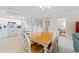 Open floor plan with dining area featuring a stylish table and chairs at 341 South Dunes Dr. # C-34, Pawleys Island, SC 29585