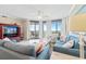 Cozy living room with ocean view, comfortable seating and nautical decor at 341 South Dunes Dr. # C-34, Pawleys Island, SC 29585