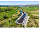 Aerial shot of a marina with boats docked amidst lush greenery and waterways at 346 Tuckers Rd. # A, Pawleys Island, SC 29585