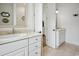 Well-lit bathroom with double sinks and vanity provides ample space at 346 Tuckers Rd. # A, Pawleys Island, SC 29585
