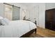 Comfortable bedroom with ensuite bathroom features a barn door for the shower at 346 Tuckers Rd. # A, Pawleys Island, SC 29585
