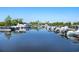 Peaceful marina showcasing various boats docked in calm, reflective water at 346 Tuckers Rd. # A, Pawleys Island, SC 29585