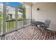 Screened-in porch with brick flooring, outdoor seating, and views of the surrounding landscape at 346 Tuckers Rd. # A, Pawleys Island, SC 29585