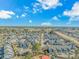 An aerial view of the condo complex showcases lush trees, easy access to the highway, and ample parking at 3700 Golf Colony Lane # 20-L, Little River, SC 29566