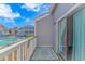 Relax on this balcony overlooking a beautiful outdoor pool at 3700 Golf Colony Lane # 20-L, Little River, SC 29566