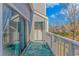 The unit balcony features a washer and dryer laundry closet, lovely outdoor rug, and nice view at 3700 Golf Colony Lane # 20-L, Little River, SC 29566