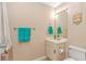 Well-maintained bathroom features vanity, mirror, and a toilet at 3700 Golf Colony Lane # 20-L, Little River, SC 29566