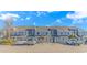 The beautiful townhomes have neutral colored facades with grey roofs and an abundance of parking at 3700 Golf Colony Lane # 20-L, Little River, SC 29566