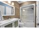 Stylish bathroom featuring a modern vanity, wood paneling, and a shower-tub combination at 3833 Myrtle Pointe Dr. # 18 Bu 3, Myrtle Beach, SC 29577