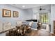 Charming dining area with a glass table, comfortable seating, and easy access to the outdoor patio at 3833 Myrtle Pointe Dr. # 18 Bu 3, Myrtle Beach, SC 29577