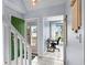 Bright entryway showcasing tile floor, green door, and office space at 3833 Myrtle Pointe Dr. # 18 Bu 3, Myrtle Beach, SC 29577