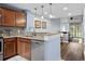 Stylish kitchen featuring wooden cabinets, stainless steel appliances, and granite countertops at 3833 Myrtle Pointe Dr. # 18 Bu 3, Myrtle Beach, SC 29577
