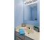 Light blue bathroom with decorative decor and vanity at 403 75Th Ave N # C, Myrtle Beach, SC 29572