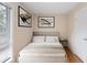 Cozy bedroom design with art and a comfortable bed at 403 75Th Ave N # C, Myrtle Beach, SC 29572