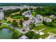 Aerial view of a building with landscaping and close proximity to a pond at 4101 Pinehurst Circle # Aa-3, Little River, SC 29566