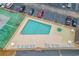 Aerial view of the pool and spa area with lounge chairs and parking spaces at 4101 Pinehurst Circle # Aa-3, Little River, SC 29566