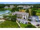 Aerial view of multi-story building near lake with parking at 4101 Pinehurst Circle # Aa-3, Little River, SC 29566