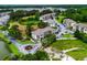 An aerial view of Cypress Bay condos featuring lush landscaping and building exteriors at 4101 Pinehurst Circle # Aa-3, Little River, SC 29566