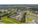 Aerial view of a condo community featuring a tennis court and outdoor pool at 4101 Pinehurst Circle # Aa-3, Little River, SC 29566