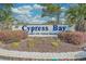 Beautiful Cypress Bay Golf and Tennis Resort entrance sign with manicured landscaping at 4101 Pinehurst Circle # Aa-3, Little River, SC 29566