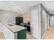 Well-equipped kitchen with modern appliances and open layout to living area at 4101 Pinehurst Circle # Aa-3, Little River, SC 29566